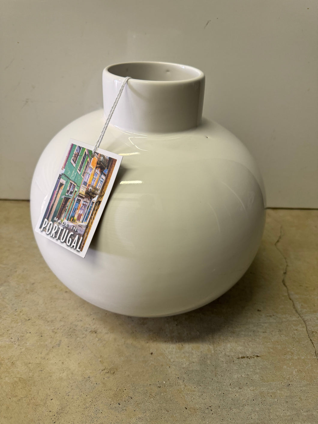 White porcelain globe vase