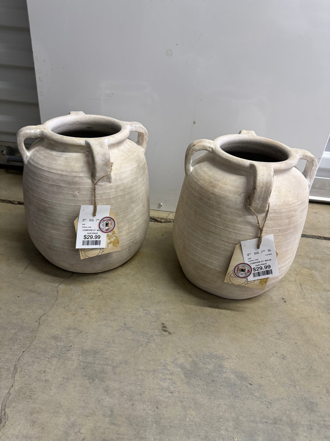 Pottery jugs with handles priced each