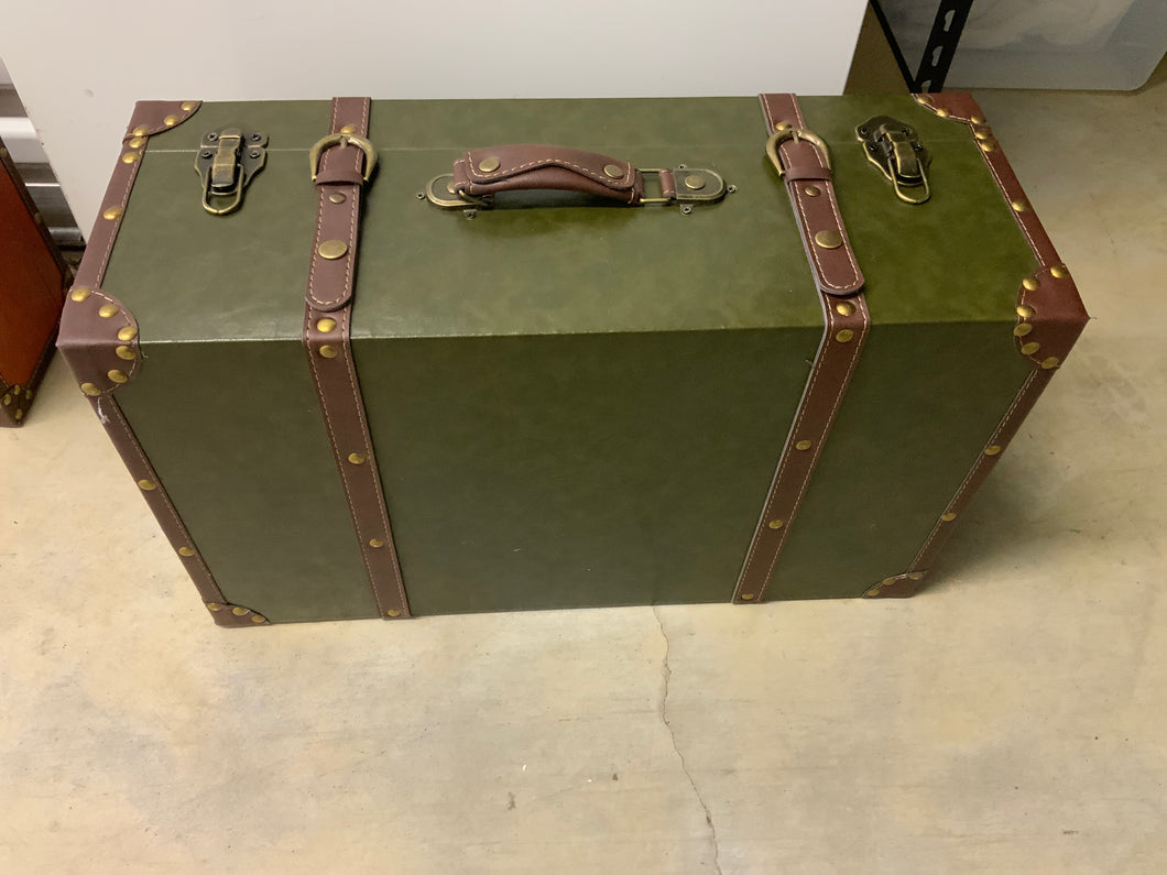 Green leather suitcase